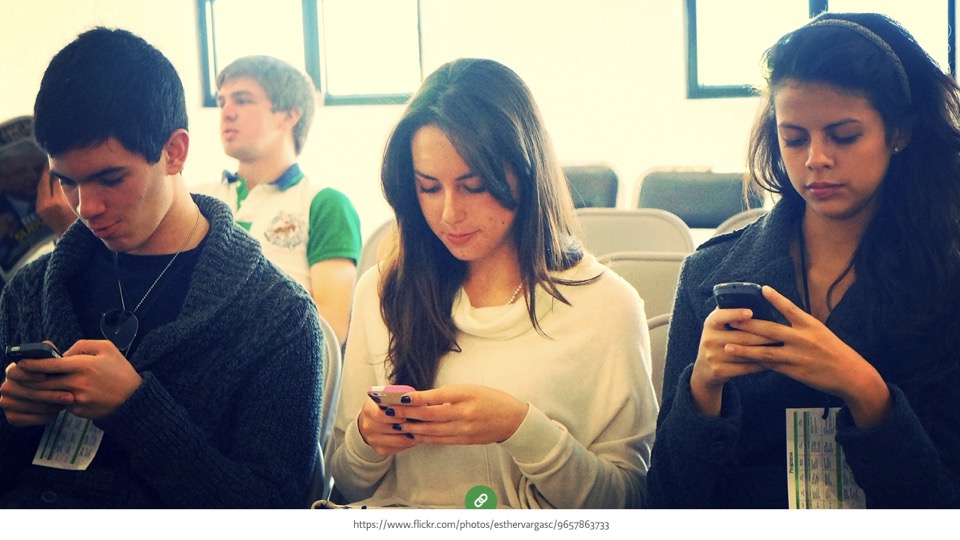 3 people using smartphones